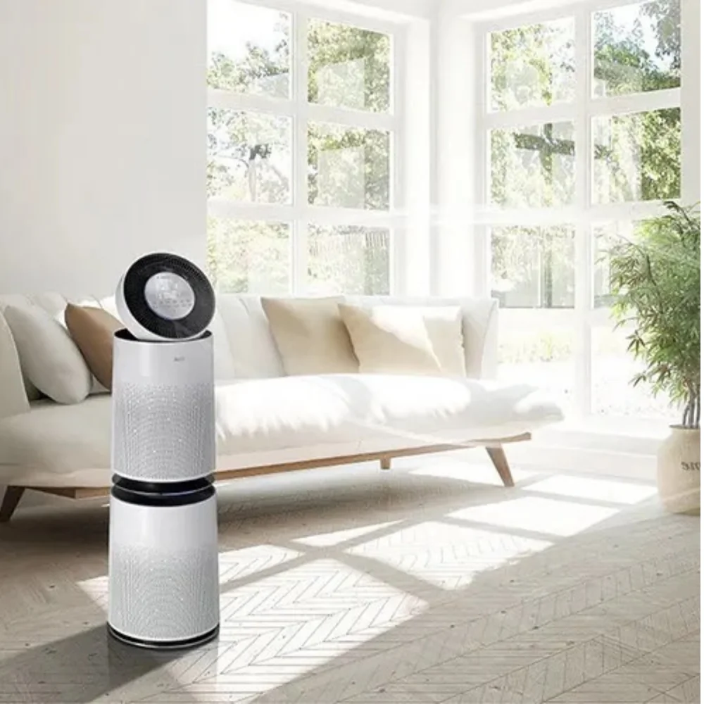 white and black air purifier in living room with white sofa